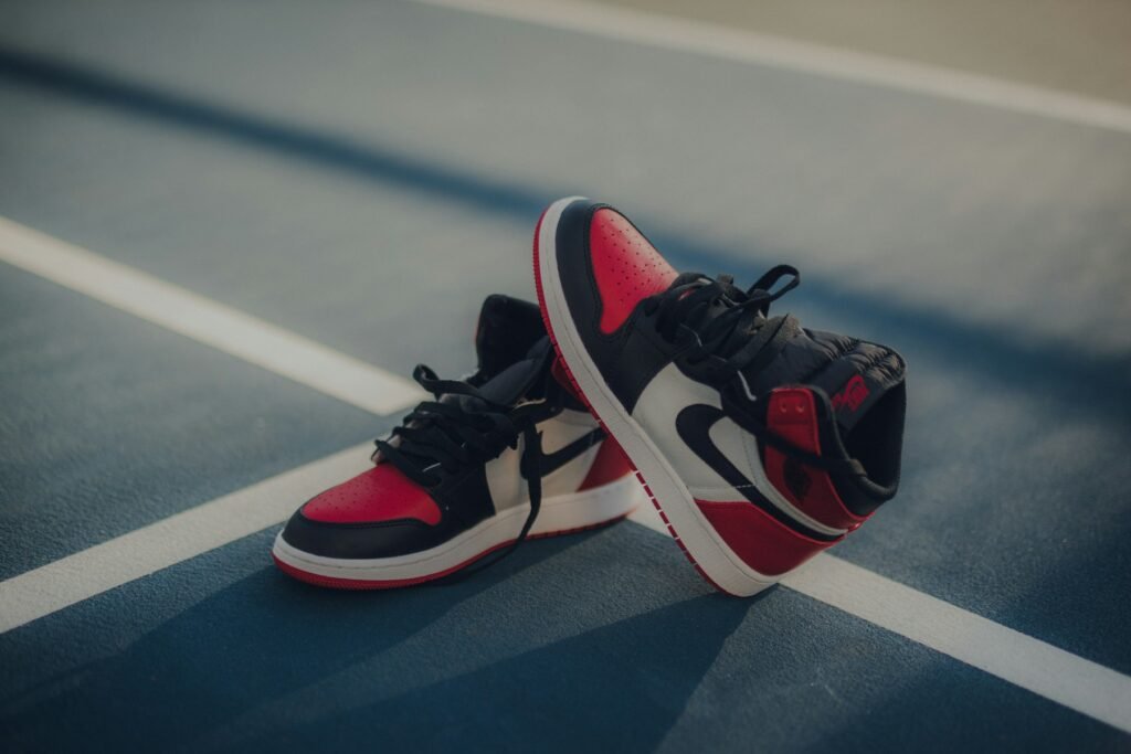 Pair of black, white and red Air Jordan sneakers