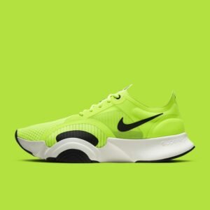 Green and black Nike running shoe