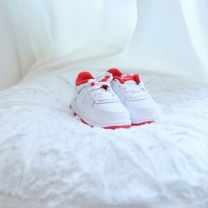 White and red Nike kids sneakers