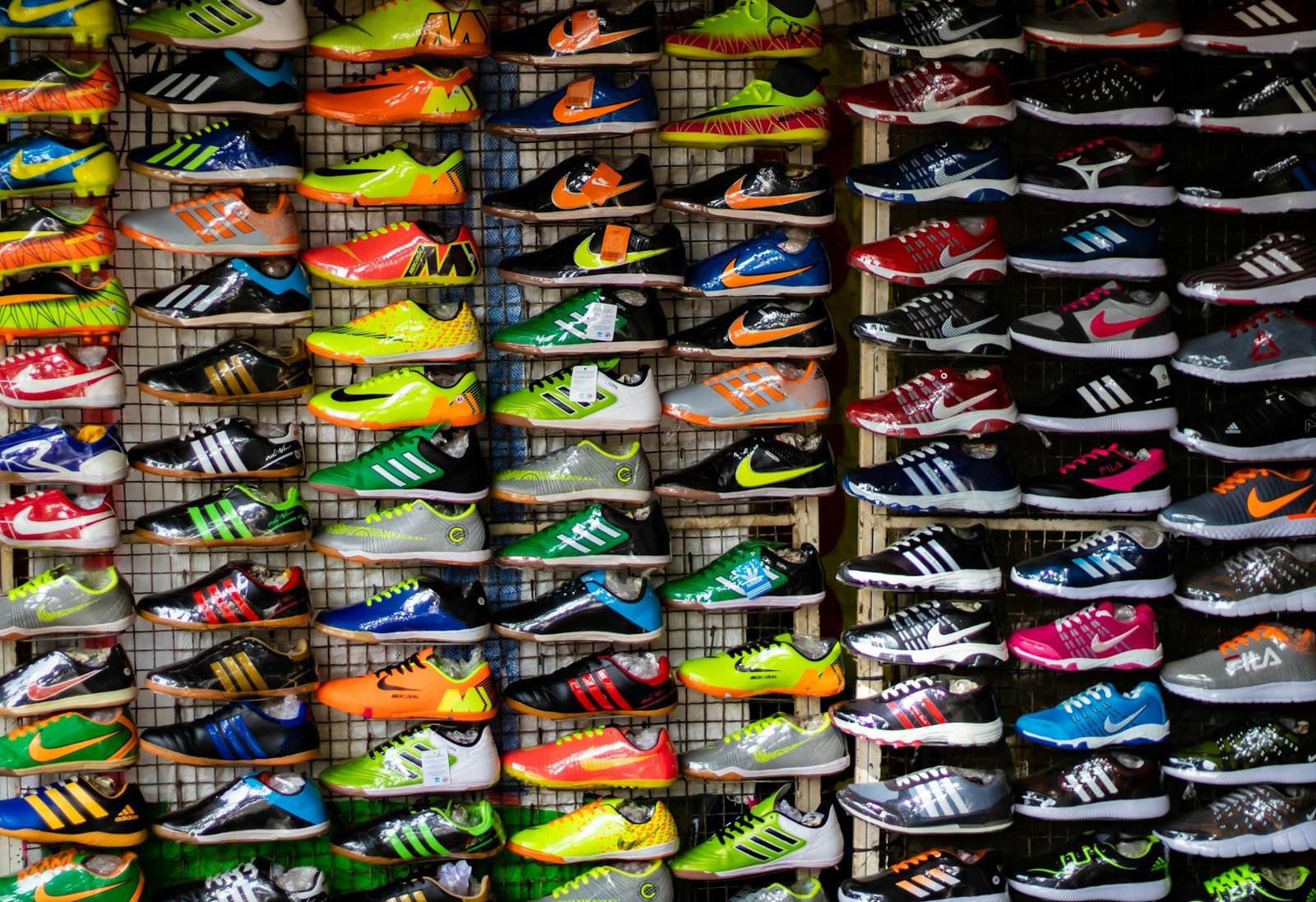 Shelf of colourful branded sneakers